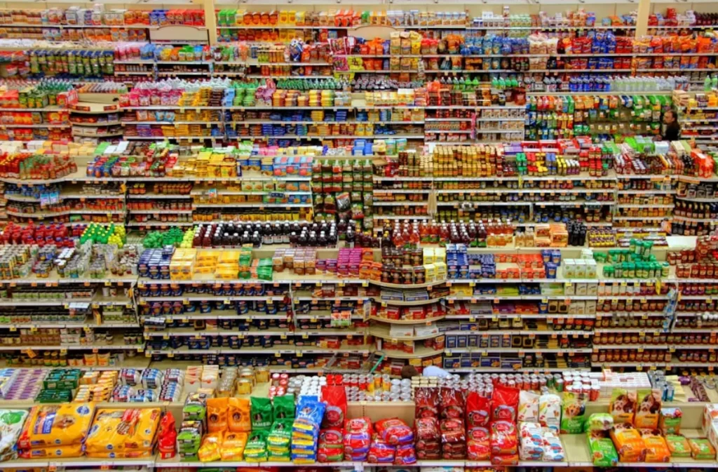 Grocery store shelves filled with a variety of colorful products.