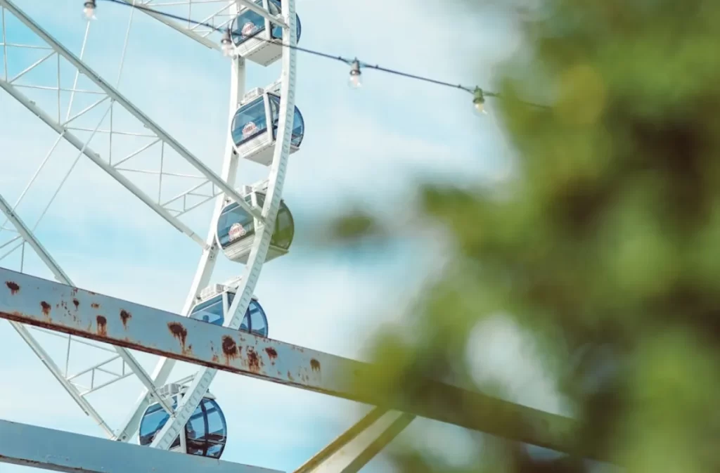 Ferris wheel cabins in motion during why mcw spin weeks event.