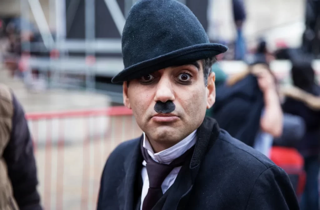 Man dressed as Charlie Chaplin showcasing comedic inspiration